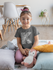 products/t-shirt-mockup-featuring-a-smiling-girl-at-home-31686_eec1b041-e561-41c5-8506-e9cfdb6ddd25.png