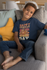 products/t-shirt-mockup-featuring-a-smiling-kid-sitting-on-a-couch-31639_76ee9095-69ce-4a6a-a60c-a9e0a30165d0.png