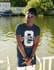 products/t-shirt-mockup-featuring-a-stylish-man-posing-by-a-lake-pier-m28575-r-el2.png