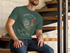 products/t-shirt-mockup-of-a-bearded-man-sitting-down-8591.png