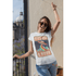 products/t-shirt-mockup-of-a-cheerful-woman-with-sunglasses-celebrating-on-a-balcony-26361_a898e175-0221-455c-a7a0-ae8de95d3169_50.png