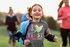 products/t-shirt-mockup-of-a-girl-running-with-other-people-39283-r-el2.png