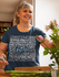 products/t-shirt-mockup-of-a-happy-woman-fixing-up-a-flower-vase-32203.png