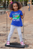 products/t-shirt-mockup-of-a-playful-girl-standing-on-a-swing-32179.png
