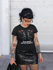 products/t-shirt-mockup-of-a-punk-woman-outside-a-closed-store-23405.png
