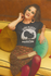 products/t-shirt-mockup-of-a-retro-setting-featuring-a-woman-with-a-book-on-her-lap-m10526.png