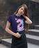 products/t-shirt-mockup-of-a-young-woman-standing-by-an-urban-stairway-27333.png