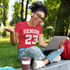 products/tee-mockup-of-a-woman-with-glasses-having-a-video-conference-on-her-laptop-m16322-r-el2.png