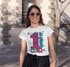 products/tee-mockup-of-a-woman-with-sunglasses-walking-around-downtown-26351.png