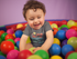 products/white-baby-boy-wearing-a-onesie-smiling-while-playing-in-the-ball-pit-mockup-14026_081baf6f-699d-493e-84d4-01c50a4a3814.png