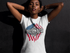 products/young-black-girl-looking-to-the-camera-while-wearing-a-tshirt-mockup-a16070_34ae2500-705d-48f9-ac2a-7e1a6a04a79f.png